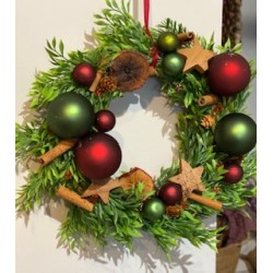 Corona navideña con tonos...